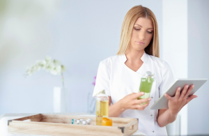 Woman reading instructions to proper use of glycolic acid.