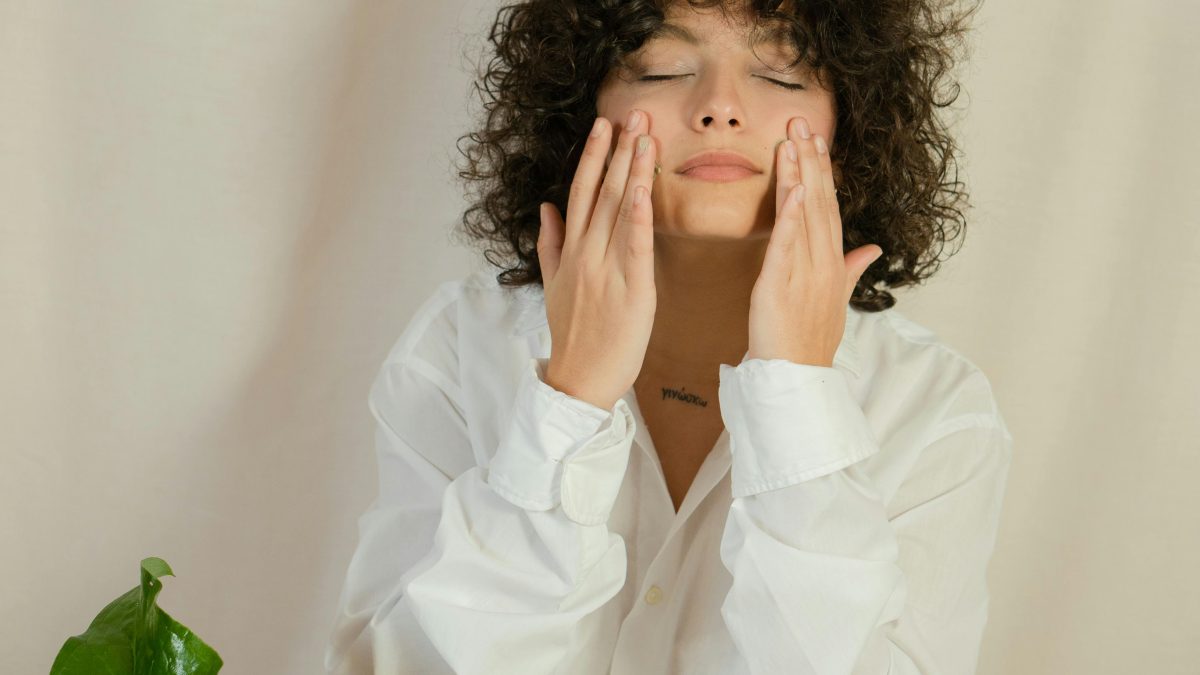 A woman in white applying salicylic acid