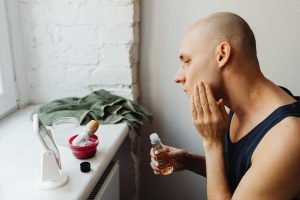 A man applying salicylic acid