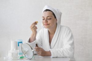 A woman doing her skincare with salicylic acid