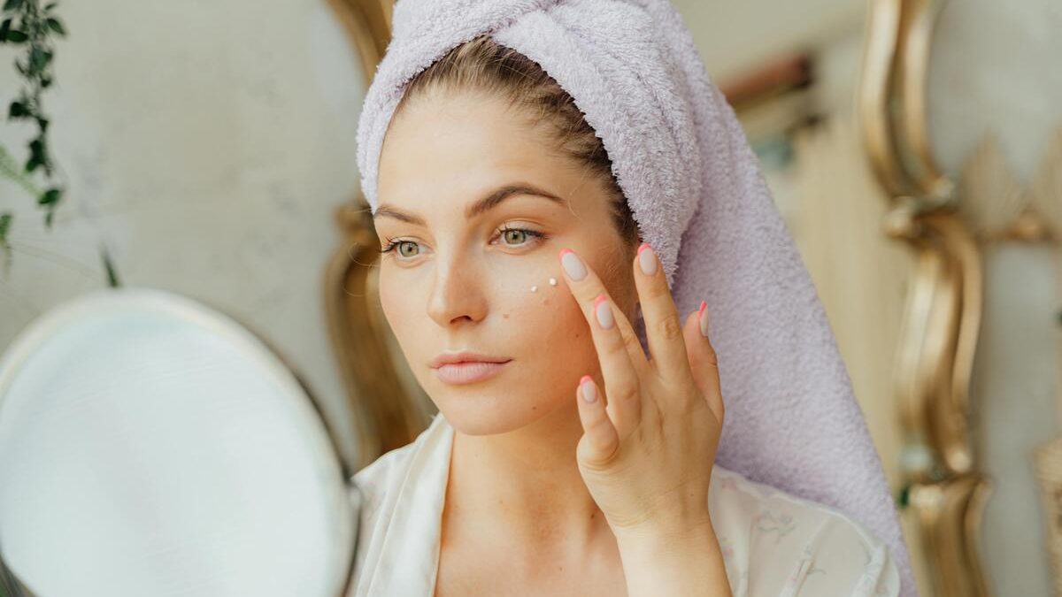 A woman using a lactic acid peel to her face