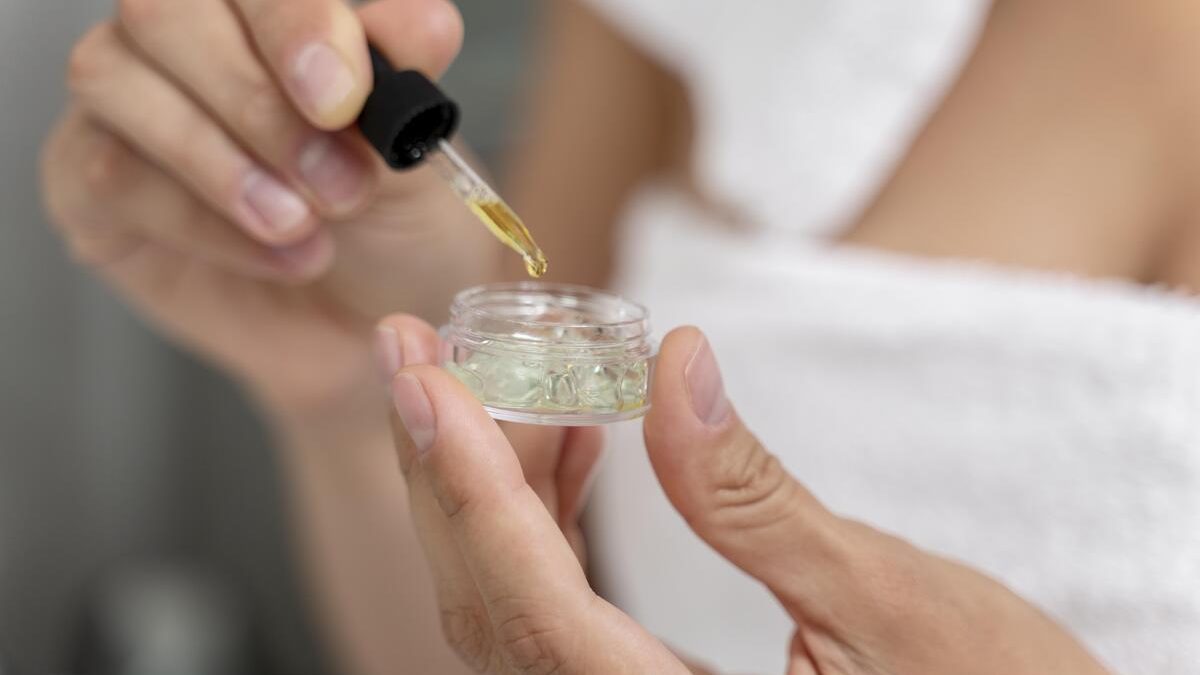 Woman inspecting lactic acid in a container