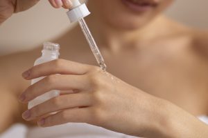 Woman testing lactic acid on her hand
